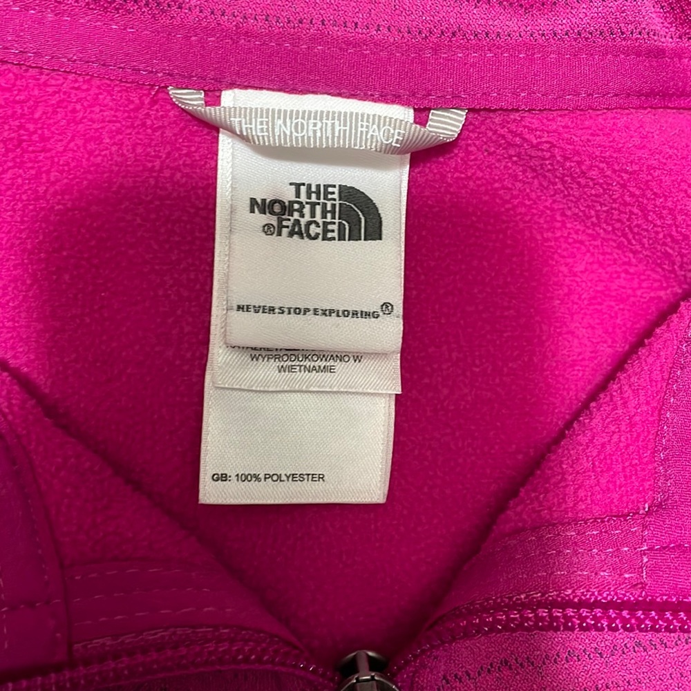 The north face zip up jacket.